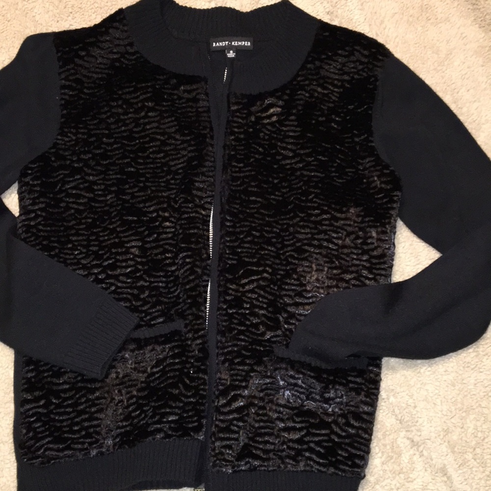 Faux fur chest and back zip long sleeved sweater.
